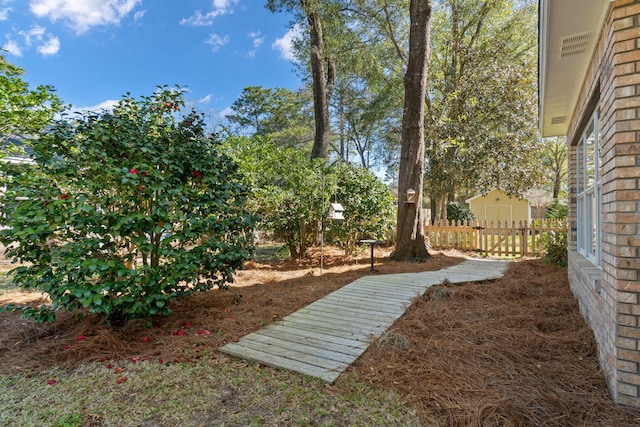 view of yard with fence