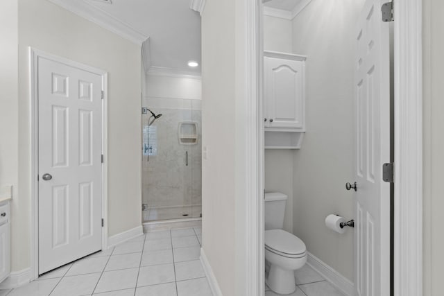 full bathroom with toilet, ornamental molding, a shower stall, baseboards, and tile patterned floors