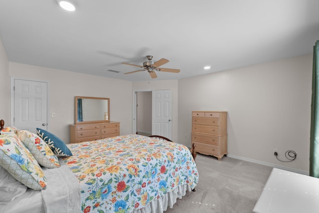 carpeted bedroom featuring recessed lighting, visible vents, ceiling fan, and baseboards