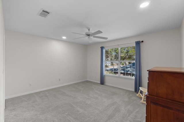 spare room featuring baseboards, visible vents, ceiling fan, carpet floors, and recessed lighting