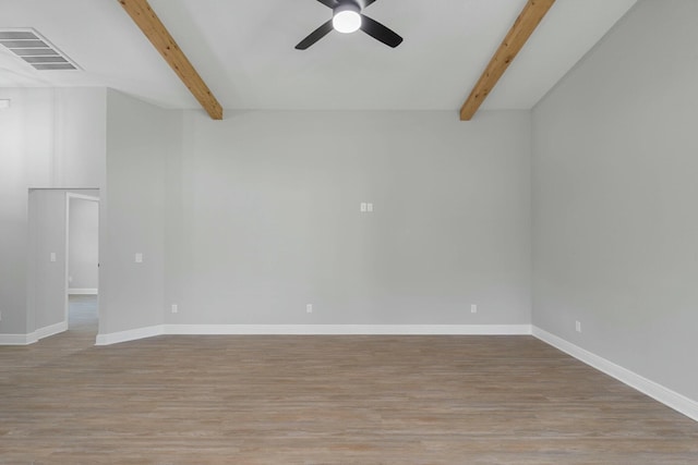 unfurnished room with a ceiling fan, baseboards, visible vents, and wood finished floors