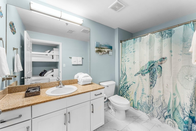 full bathroom with visible vents, connected bathroom, toilet, marble finish floor, and vanity