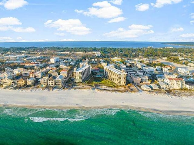 bird's eye view featuring a view of city, a beach view, and a water view