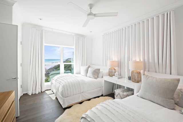 bedroom with ceiling fan and wood finished floors