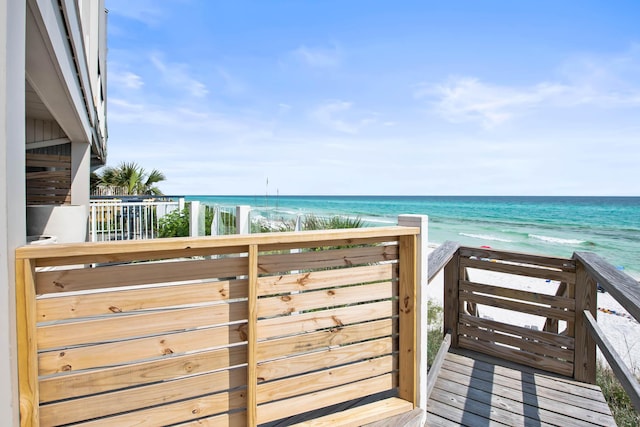 view of community featuring a water view and a view of the beach