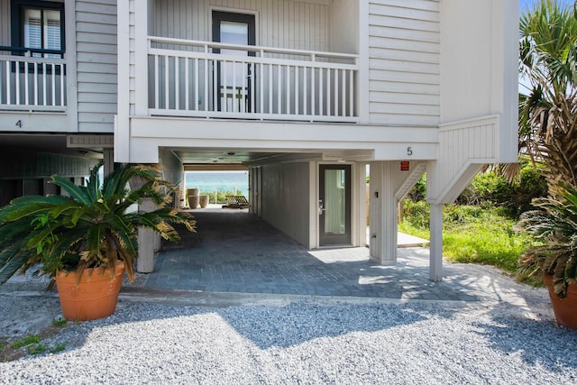 surrounding community with a carport and driveway