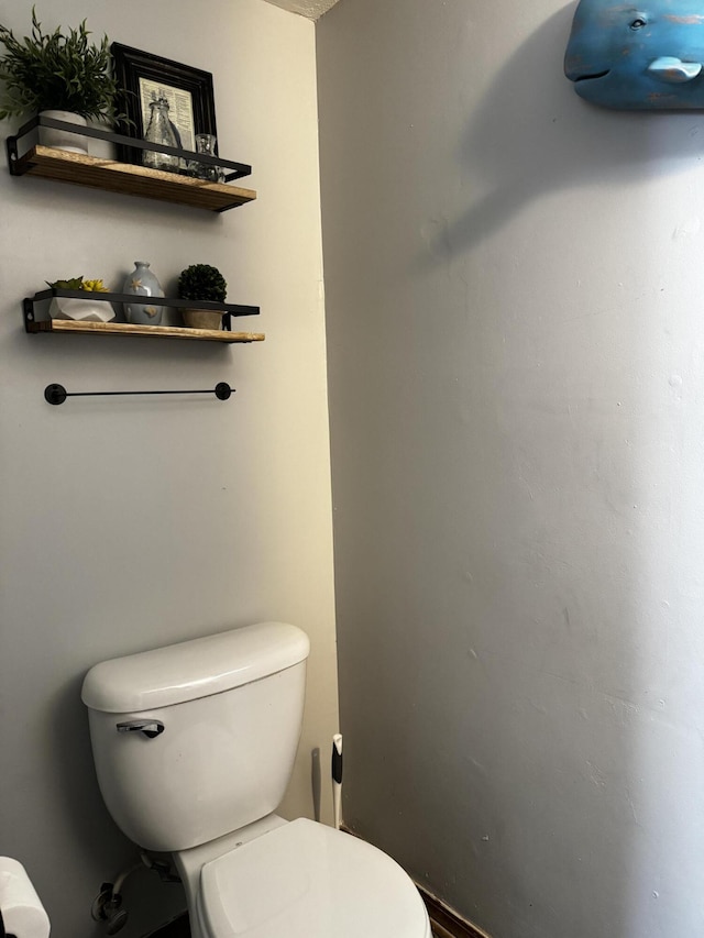 bathroom featuring toilet