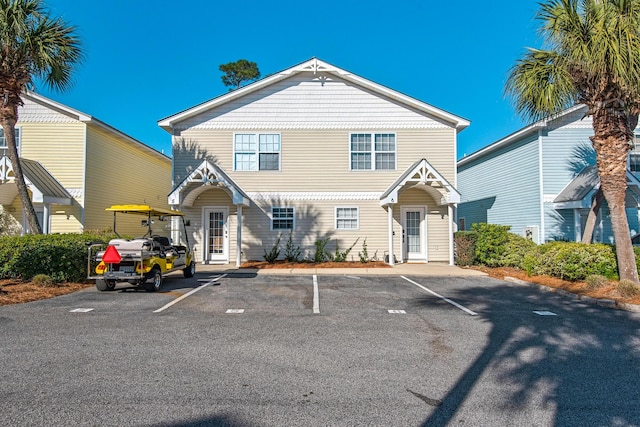 view of front of house featuring uncovered parking