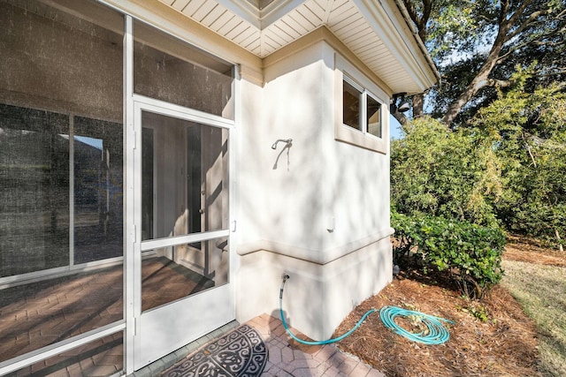 exterior space featuring a sunroom