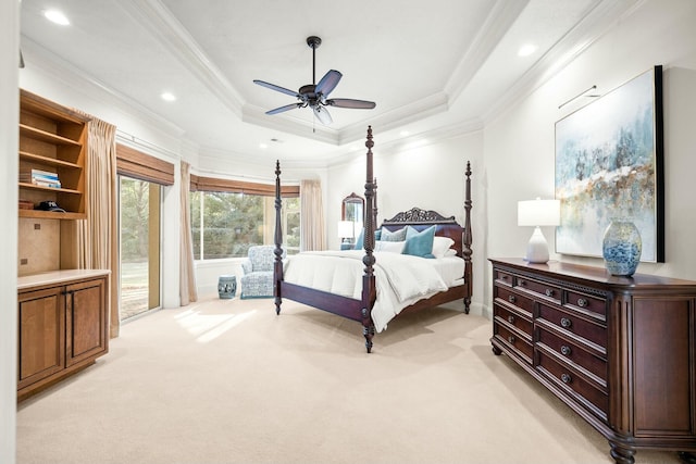 bedroom featuring access to outside, a raised ceiling, crown molding, and light colored carpet