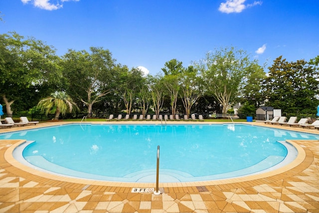 community pool featuring a patio area