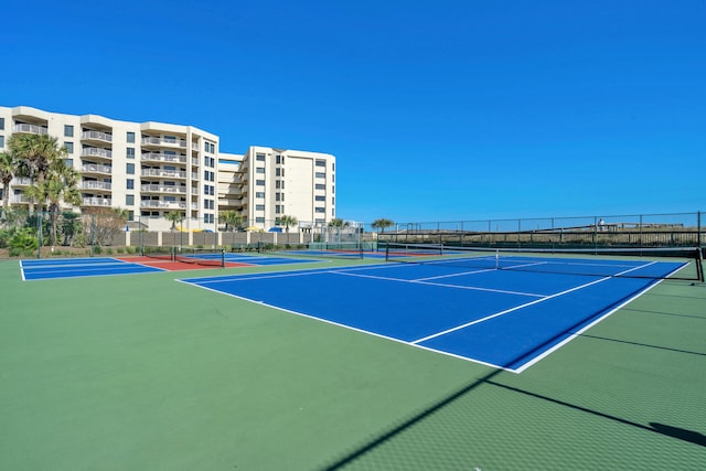 view of sport court with community basketball court and fence