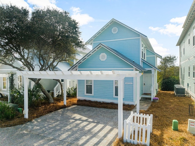 view of front of house with central air condition unit