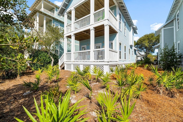 view of home's exterior with covered porch