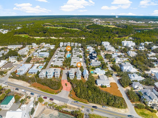 bird's eye view with a residential view and a forest view