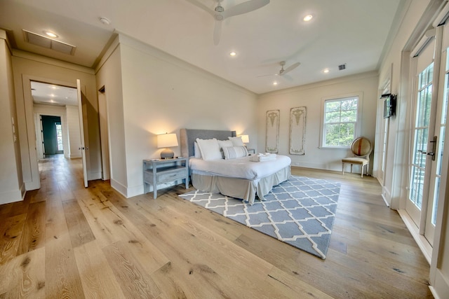 bedroom featuring light wood-style flooring, baseboards, crown molding, and recessed lighting