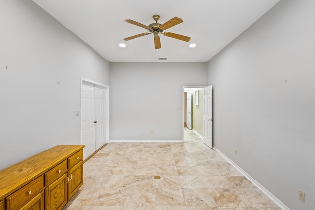 empty room with recessed lighting, visible vents, ceiling fan, and baseboards