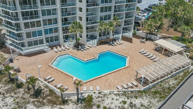 community pool with a patio