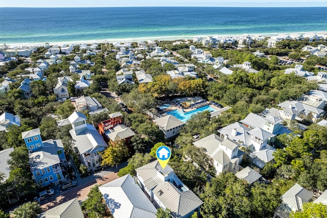 bird's eye view with a view of the beach, a residential view, and a water view