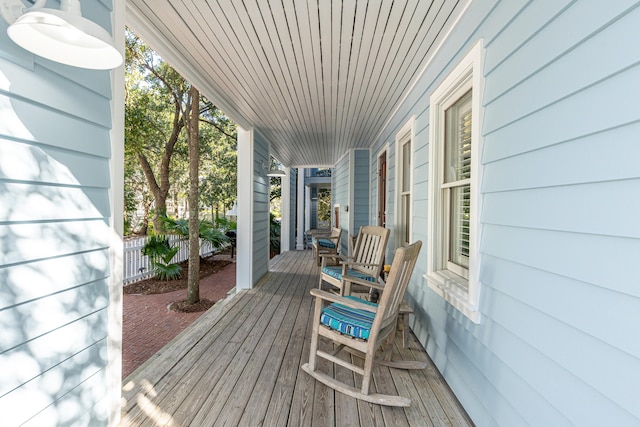 wooden deck featuring a porch