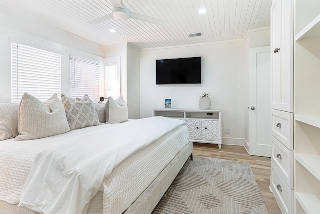 bedroom with light wood-style flooring, recessed lighting, wood ceiling, visible vents, and crown molding