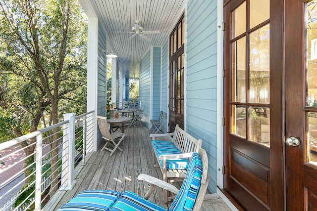 wooden terrace with ceiling fan