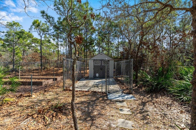 view of yard with an outdoor structure and fence