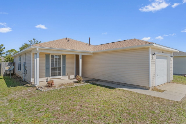 ranch-style house with a garage, a front yard, and roof with shingles