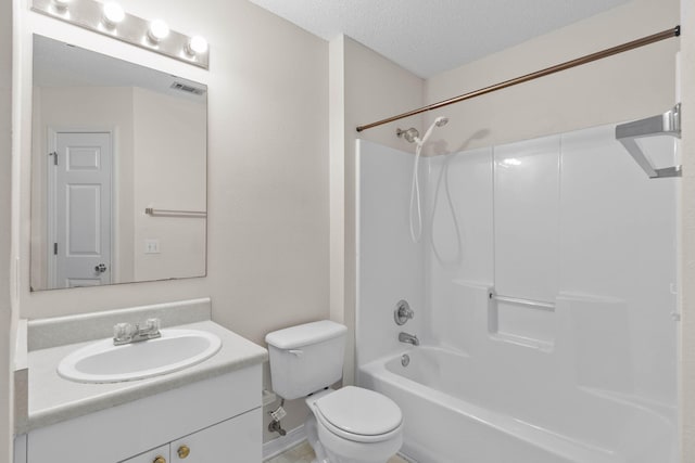 full bath featuring shower / washtub combination, visible vents, toilet, a textured ceiling, and vanity