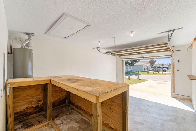 garage featuring water heater