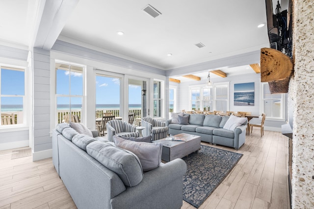 living room featuring beam ceiling, recessed lighting, visible vents, and light wood-style floors