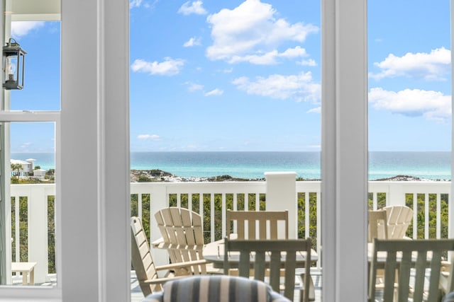 balcony featuring a water view