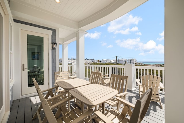 balcony with outdoor dining area