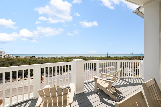 wooden deck with a water view