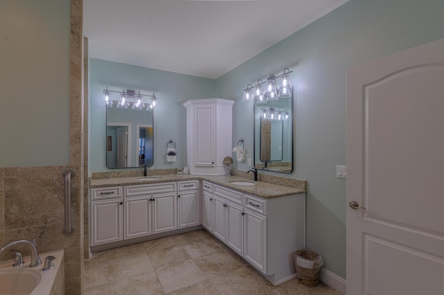 full bathroom with double vanity, a sink, and a bathing tub