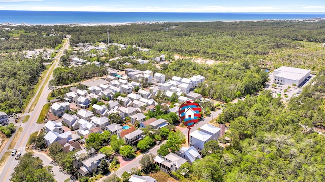 bird's eye view with a residential view and a wooded view