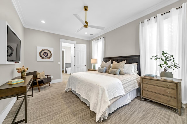 bedroom featuring light carpet, baseboards, ensuite bath, crown molding, and recessed lighting