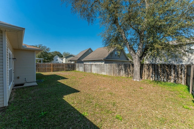 view of yard featuring a fenced backyard