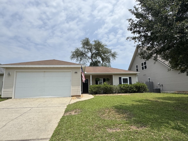 202 Ladue Ave, Crestview, FL 32539 - view of front of home with driveway, a garage, and a front lawn
