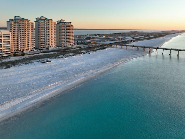 drone / aerial view with a view of the beach and a water view