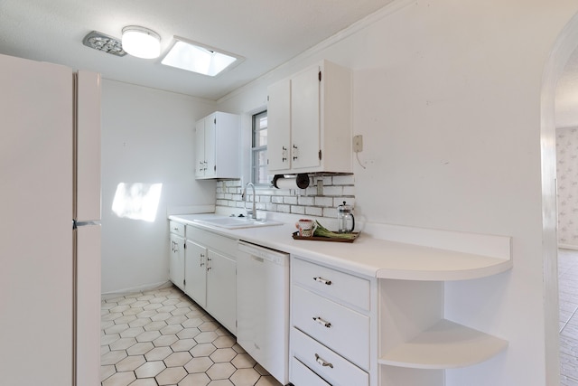 kitchen featuring white appliances, open shelves, a sink, white cabinetry, and backsplash