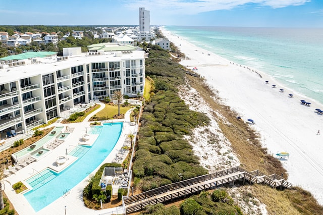 bird's eye view with a beach view and a water view