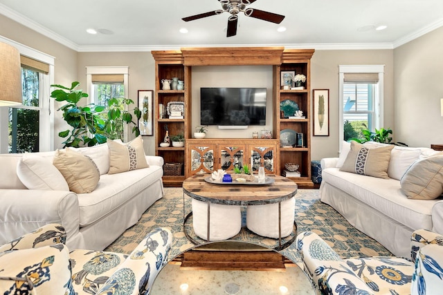 living room featuring a ceiling fan, crown molding, recessed lighting, and a healthy amount of sunlight