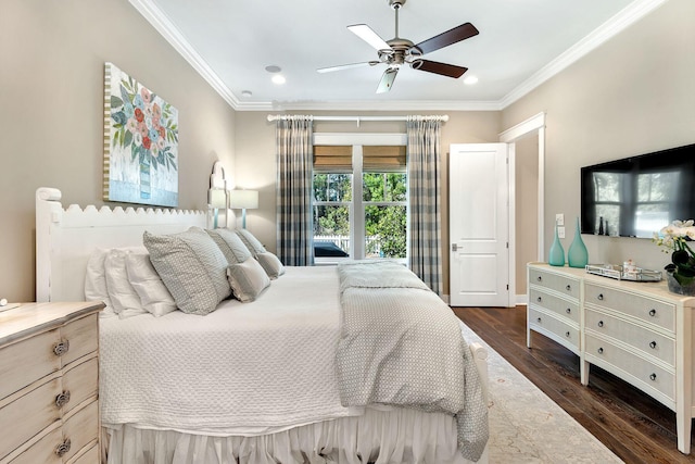 bedroom with dark wood finished floors, ceiling fan, and ornamental molding