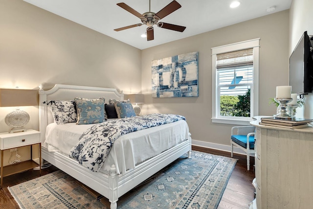 bedroom with recessed lighting, baseboards, wood finished floors, and a ceiling fan