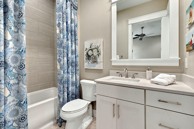 bathroom featuring shower / tub combo with curtain, toilet, vanity, and a ceiling fan