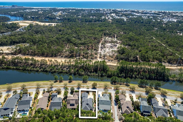 bird's eye view with a residential view and a water view