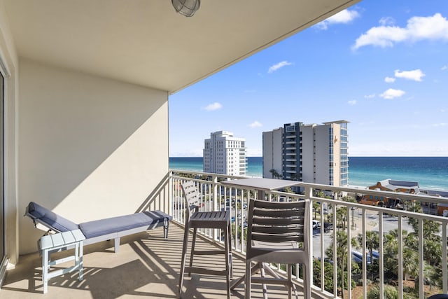 balcony featuring a water view