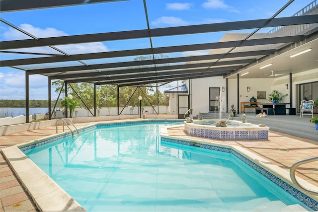 view of pool with a lanai, a jacuzzi, a water view, a fenced in pool, and a patio area