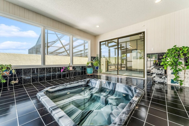 view of pool featuring an indoor hot tub